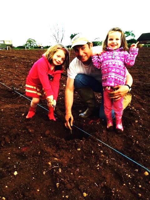 Fearless sailor, Rob, with his girls, planting their very first grapevine at Colemere Vineyard back in 2014.